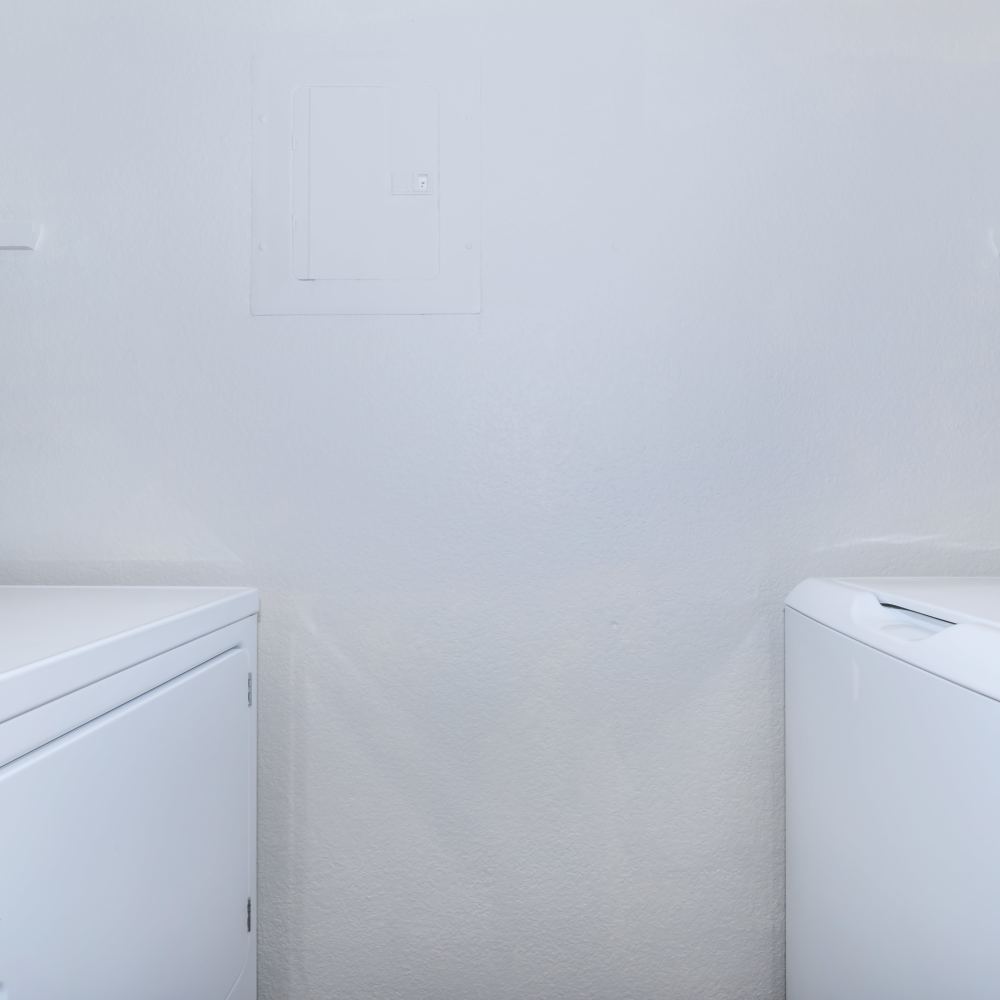 Laundry room with washer and dryer at One Belmar Place in Lakewood,Colorado