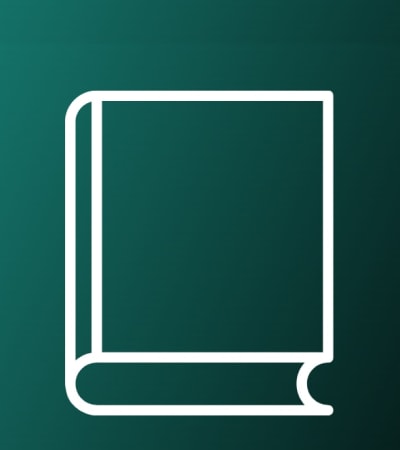 Resident reading book in library near Courtyard Apartments in Columbia, Missouri