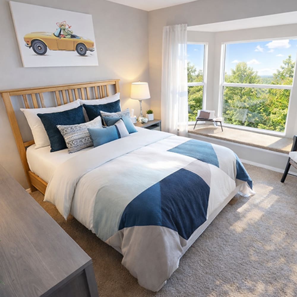 Bedroom with a large bed at Central Park Place in Grand Rapids, Michigan