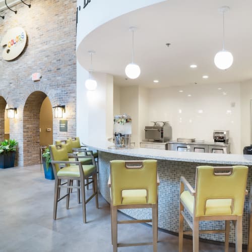 Open lounge areas and bar space for residents at Celebration Village Forsyth in Suwanee, Georgia