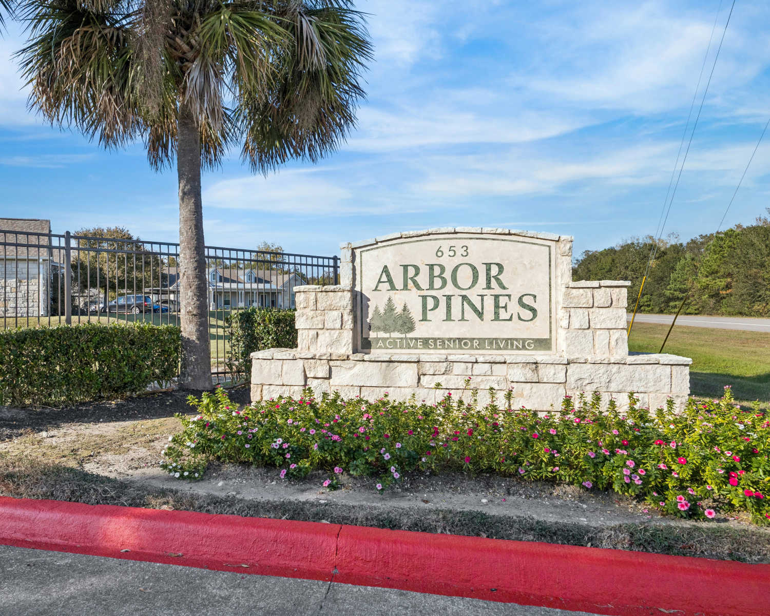 Charming entrance at Arbor Pines in Orange, Texas