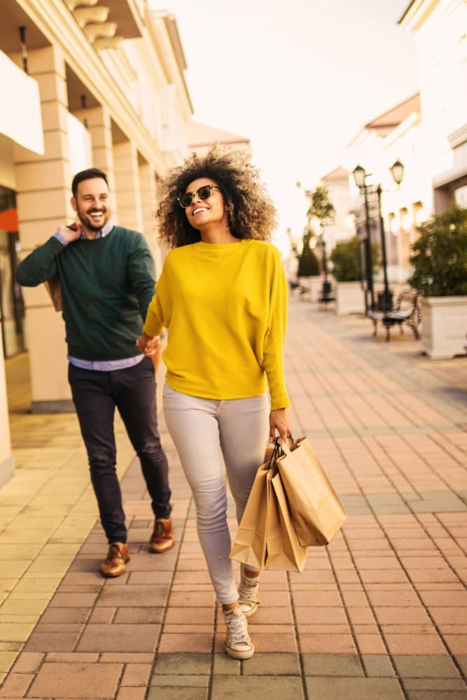 Resident couple walking about town near Six 10 Flats in Bethlehem, Pennsylvania