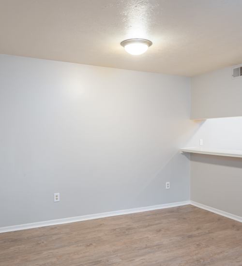 Dinning area room with wooden flooring at Twyckenham Apartments in Lafayette, Indiana