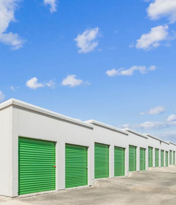 A customer place a package  at Storage Hub - Grissom in San Antonio, Texas