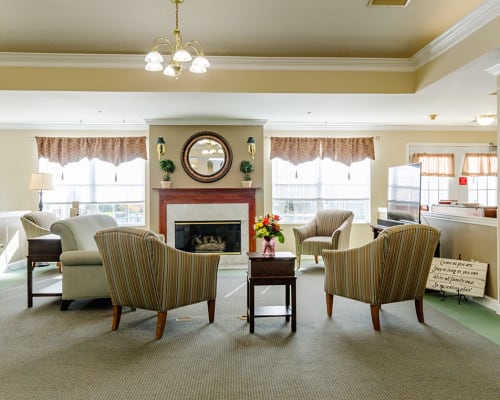 Community area with fireplace at Trustwell Living at Oakley Place in Greenville, Ohio