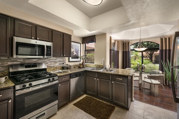 Large luxury kitchen and dining room at San Cervantes in Chandler, Arizona