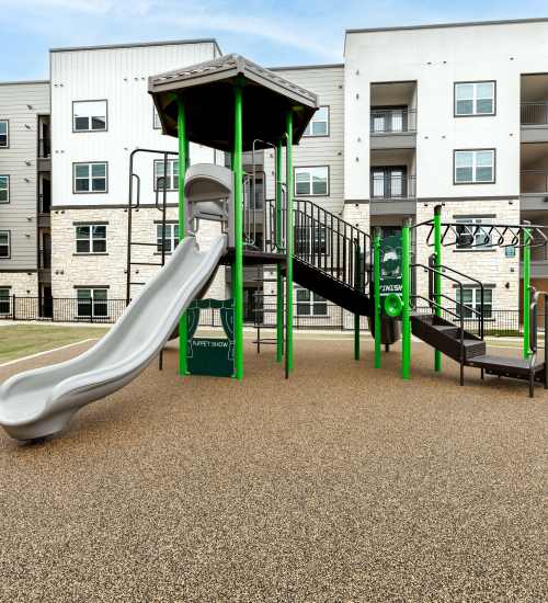 Playground at The Janson in Del Valle, Texas