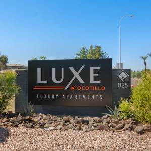 Exterior property signage at Luxe @ Ocotillo in Chandler, Arizona