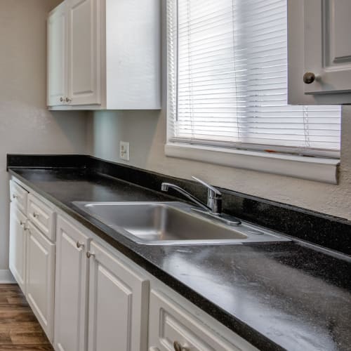 Kitchen with a window over the sink at Costa Del Lago in Lake Worth, Florida