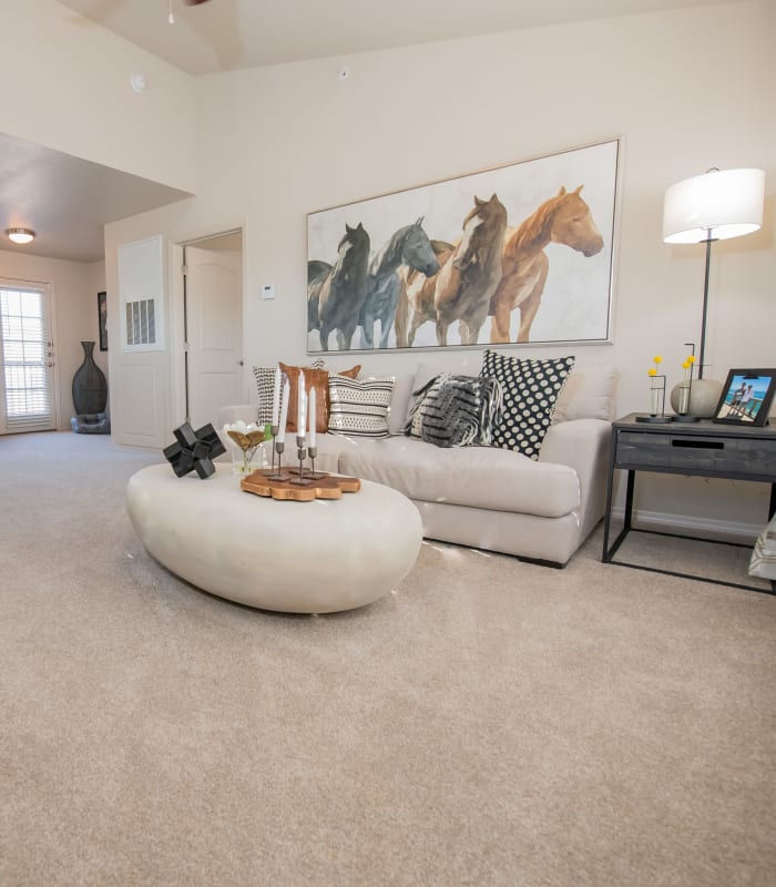 Spacious living room at Portico at Friars Creek Apartments in Temple, Texas