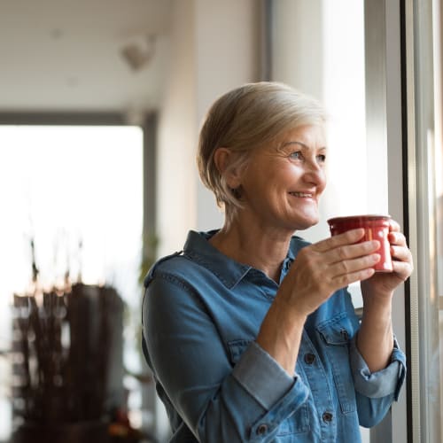 A resident getting her coffee  at Forster Hills in Oceanside, California