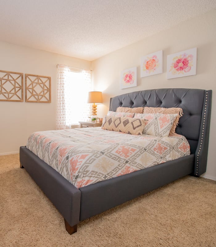 Spacious carpeted bedroom at Summerfield Place Apartments in Oklahoma City, Oklahoma