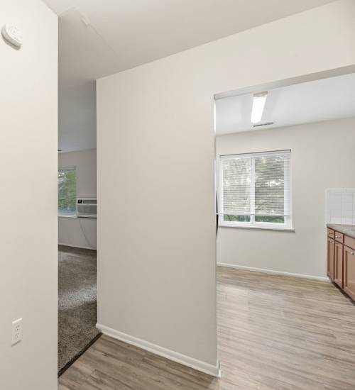 Living area connecting rooms at Pin Oak Manor Apartments in Mishawaka, Indiana