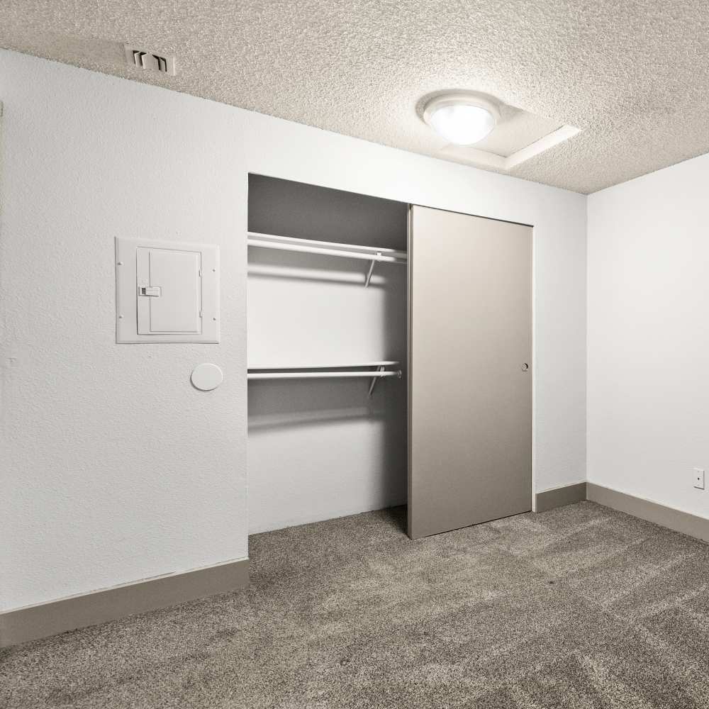 Bedroom with closets at Lodge at Madrona Ridge in Tacoma, Washington