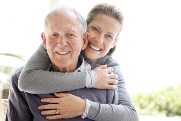Resident couple hugging at Randall Residence of Centerville in Centerville, Ohio