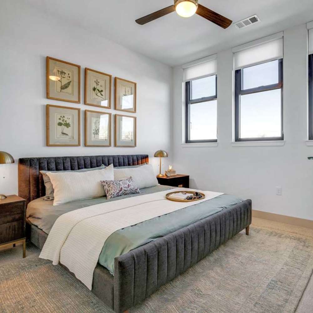 Bedroom with ceiling fan at Katy Trail Uptown in Dallas, Texas