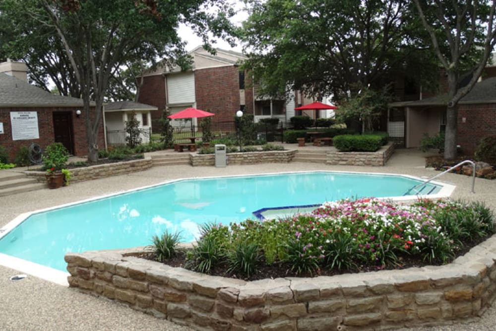 Swimming pool and flowerbed at Willow Glen in Fort Worth, Texas