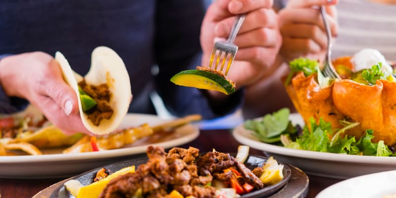 Residents eating near Del Mar I in Oceanside, California