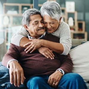 Two residents embracing at Windsor House Corporate in Girard, Ohio