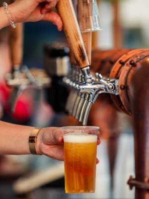 A drink being poured at a brewery near The Columbia at the Waterfront in Vancouver, Washington