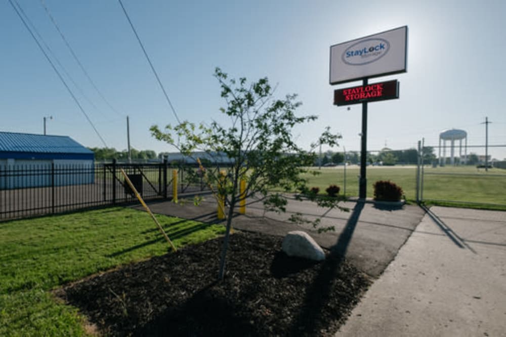 A side view of the sign and entrance to StayLock Storage in Frankfort, Indiana