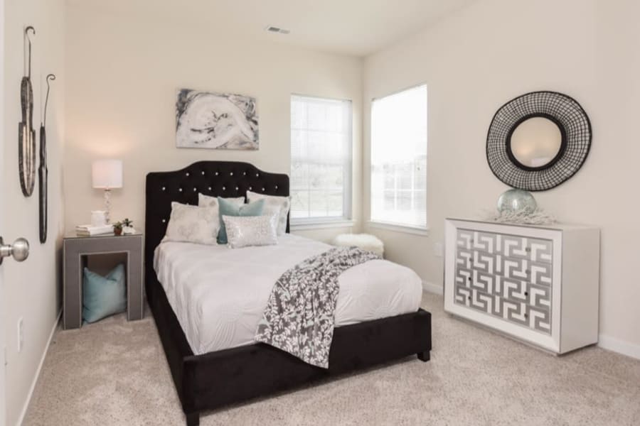Large resident bedroom at Aventura at Towne Centre in Ellisville, Missouri.