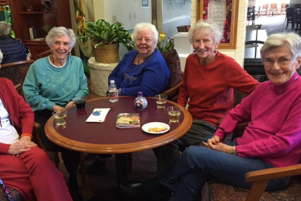 Resdients Enjoying a Drink at Hilltop Commons Senior Living in Grass Valley, California