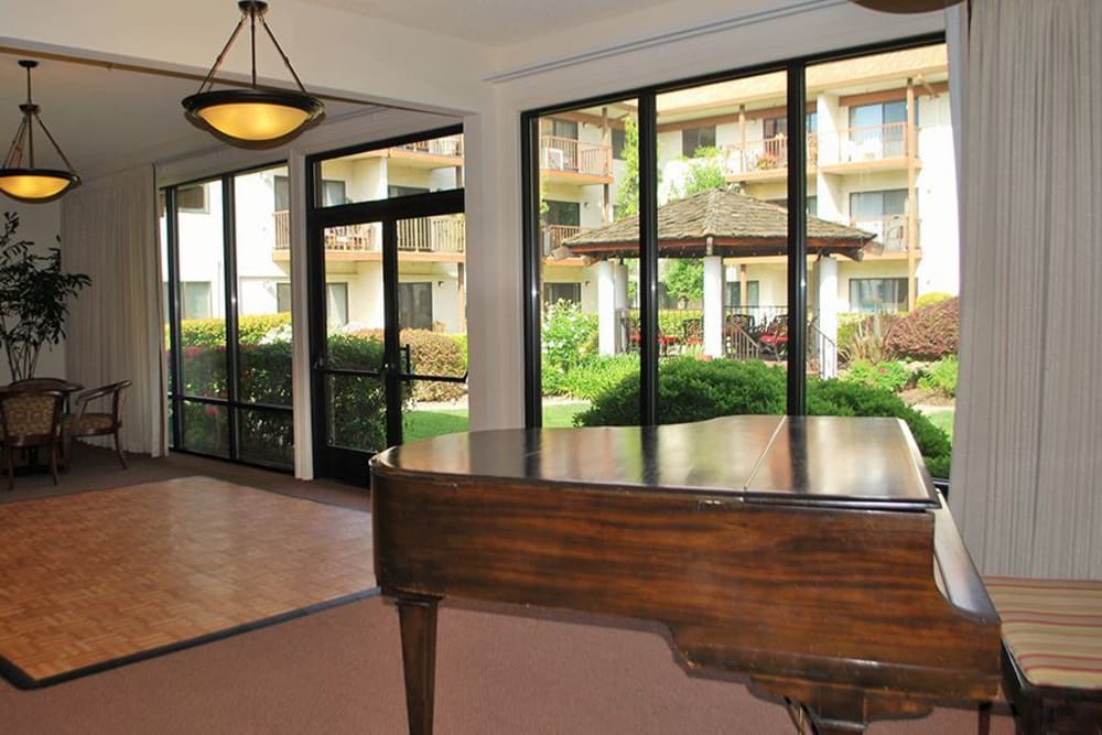 Piano area for residents to enjoy music at Roseville Commons Senior Living in Roseville, California