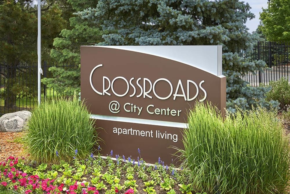 The front sign at Crossroads at City Center Apartments in Aurora, Colorado