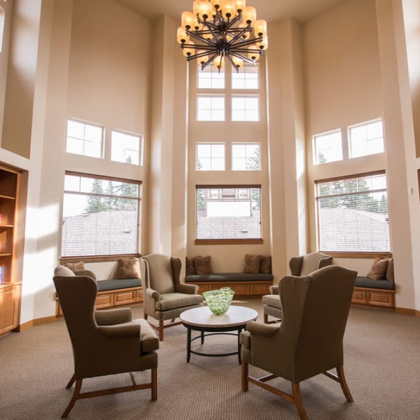 Sunlit reading room at Quail Park of Lynnwood in Lynnwood, Washington