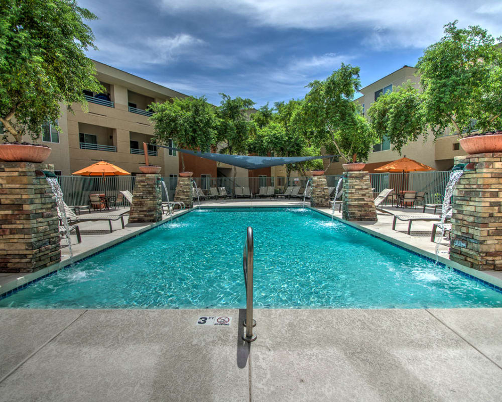 Shimmering pool on a sunny day at Sage Luxury Apartment Homes in Phoenix, Arizona