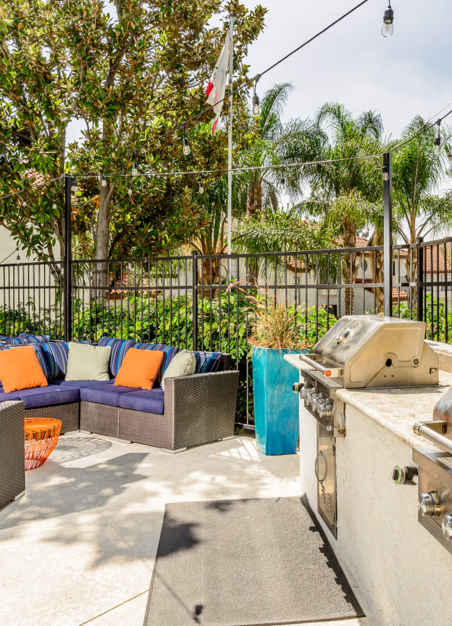 Outdoor grills for poolside picnics at Sonora at Alta Loma in Alta Loma, California