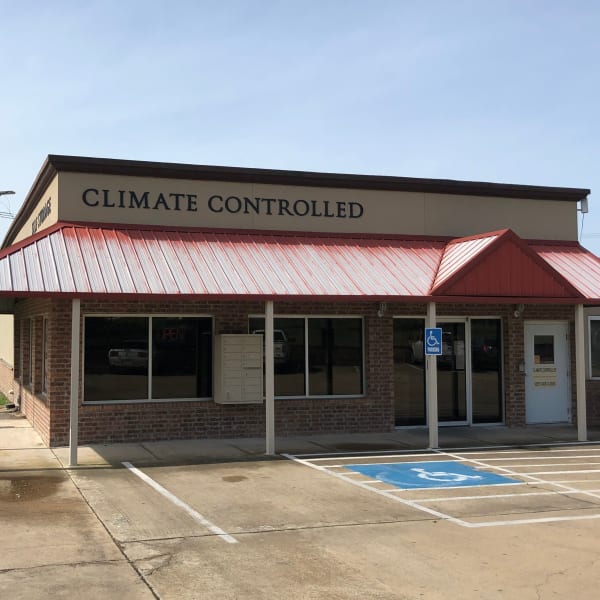 Exterior of the leasing office at StorQuest Self Storage in Kyle, Texas