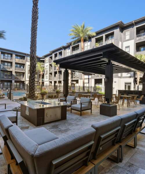 A covered outdoor sitting area at Steelhouse in Orlando, Florida
