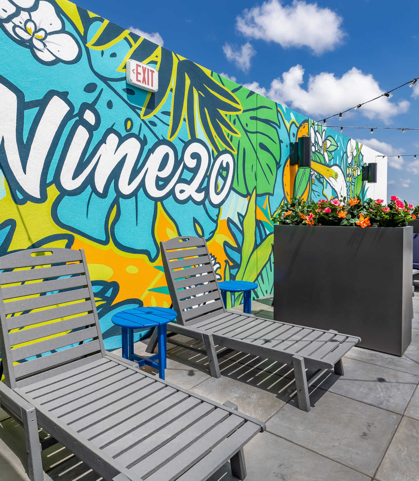 Residents celebrating with drinks at a restaurant near Nine20 Manatee in Bradenton, Florida