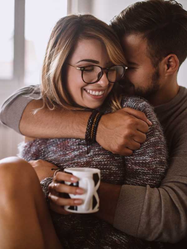 Resident couple embracing in their home at Topaz in San Diego, California