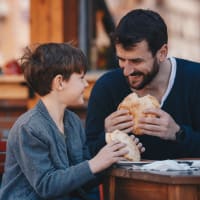 Father and son enjoying lunch near Lafayette Oaks in Lafayette, California