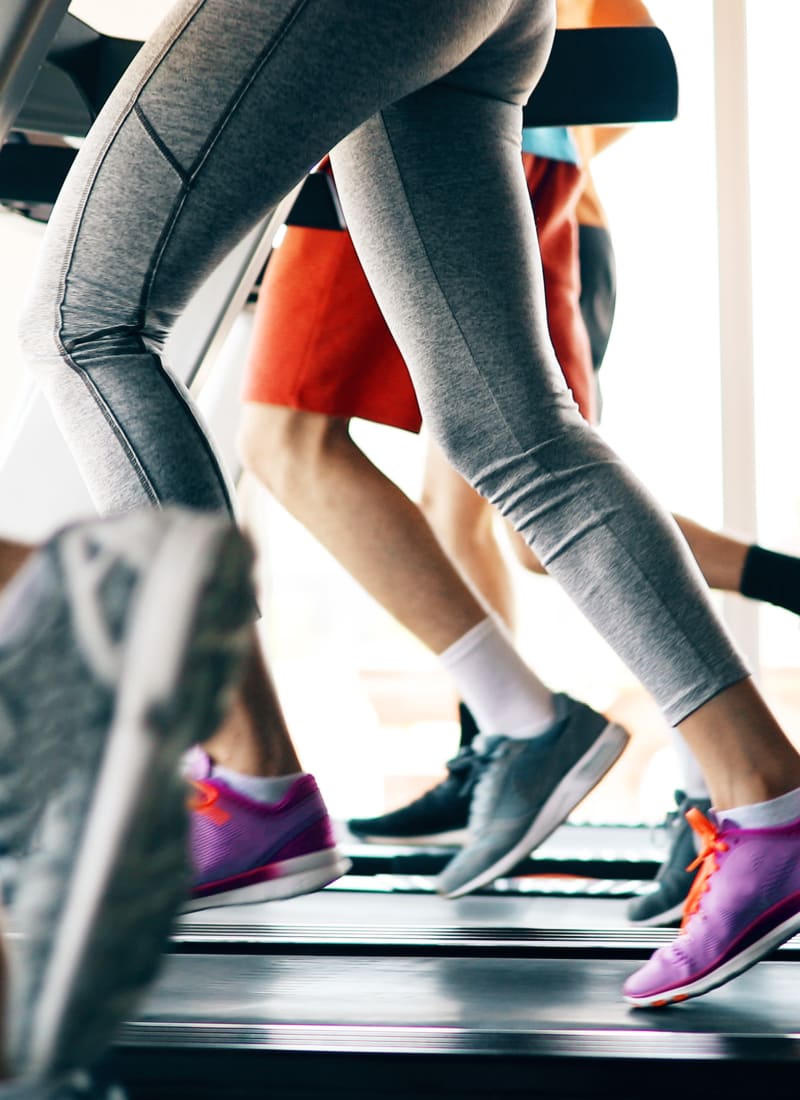 Residents running on treadmills at Marquis at Kingwood in Kingwood, Texas