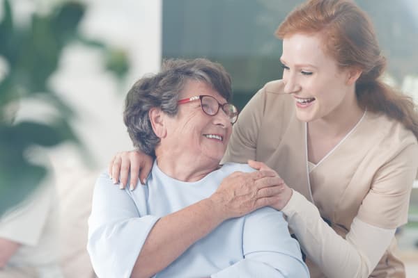 Happy resident receiving care at Grace Manor Assisted Living in Nashville, Tennessee