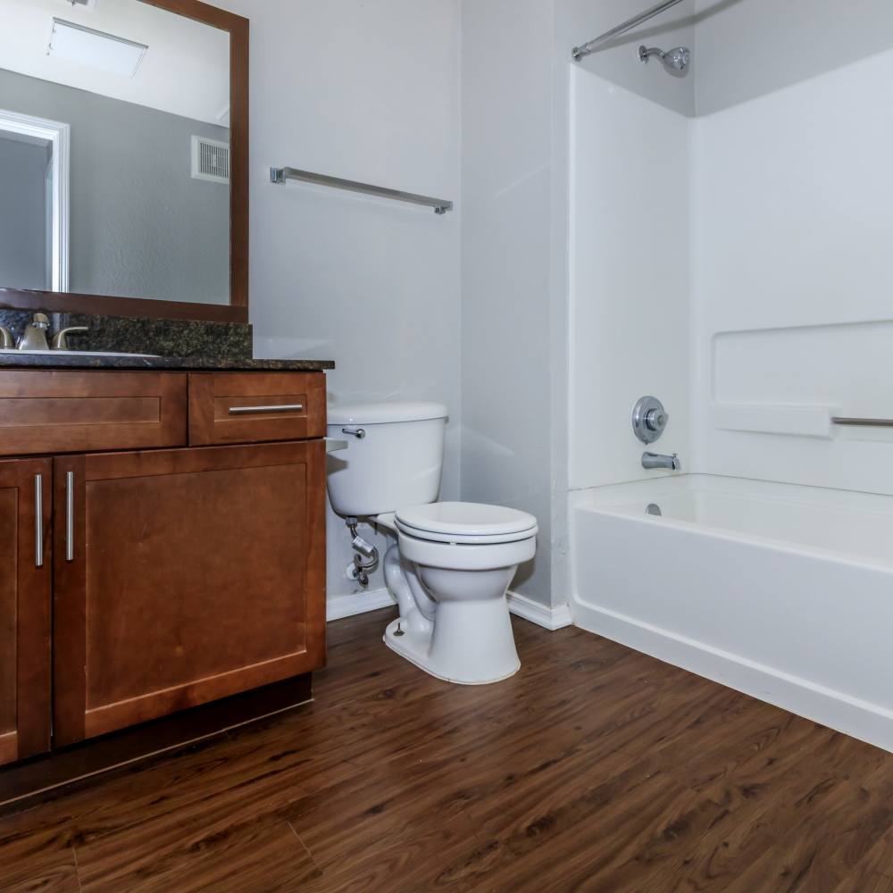Bathroom with wooden flooring at One Belmar Place in Lakewood,Colorado