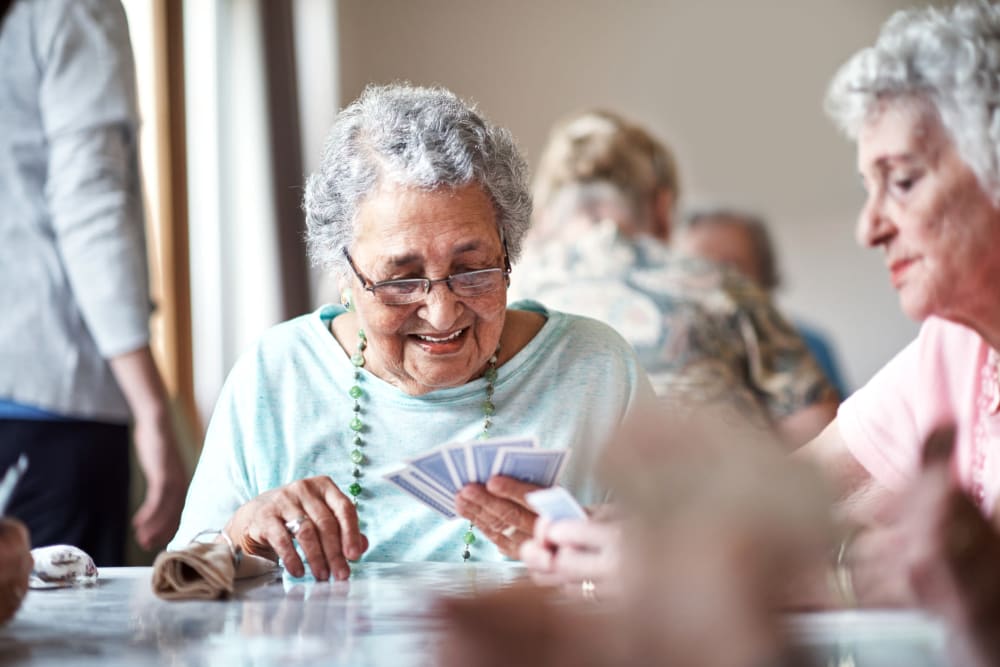  residents playing cards at Vista Prairie Communities in Champlin, Minnesota