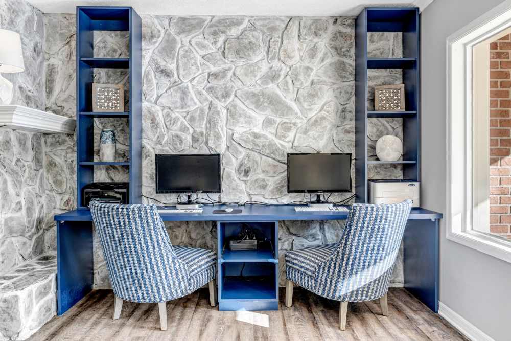 Community business center with computers at Lake Carlton Arms in Lutz, Florida