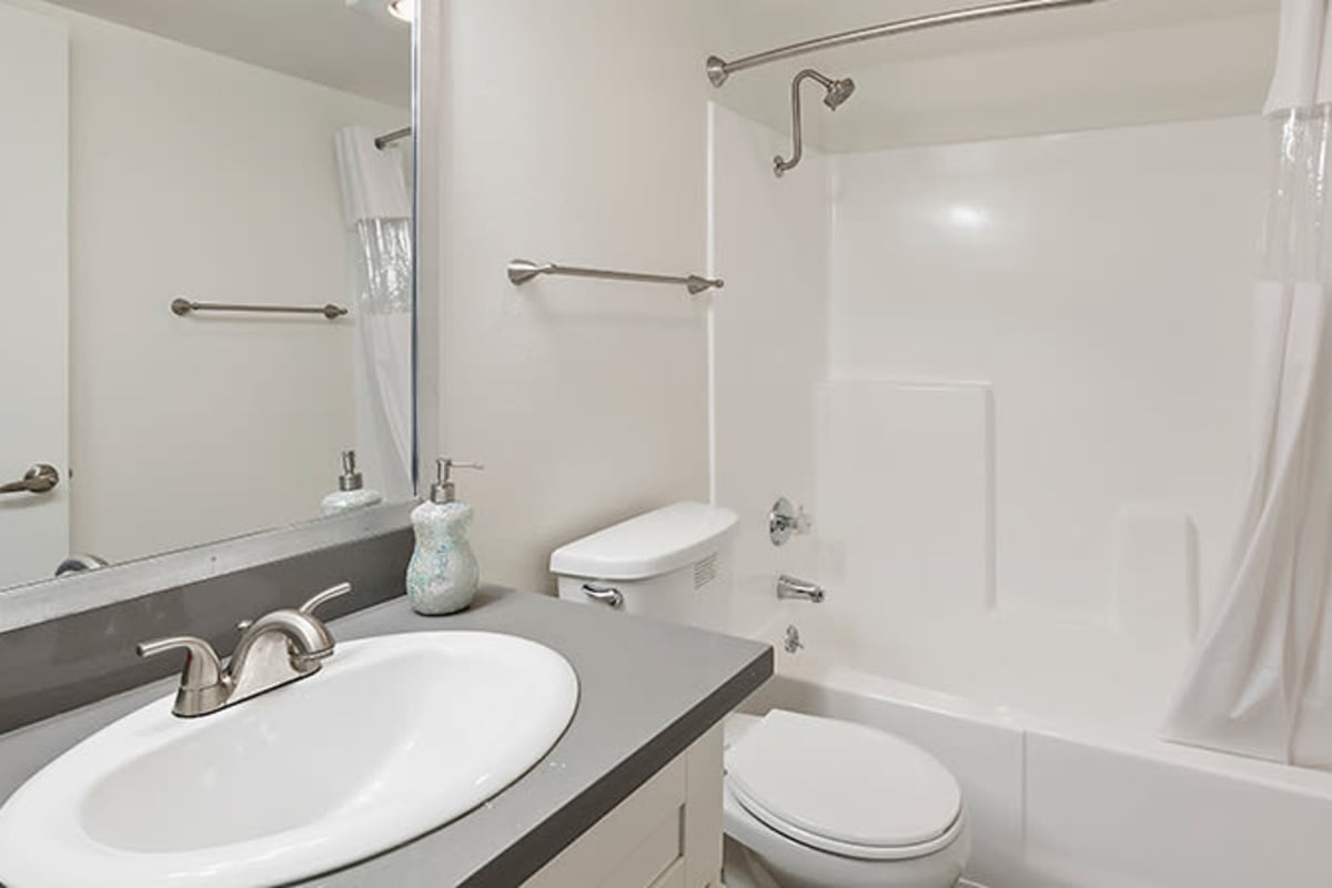 Bathroom with modern finishes at Kingsley Drive Apartments, Los Angeles, California