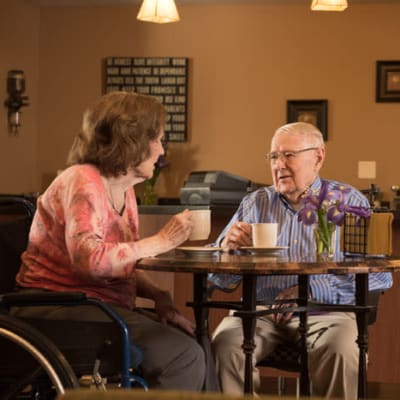 Resident talking with another resident at York Gardens in Edina, Minnesota