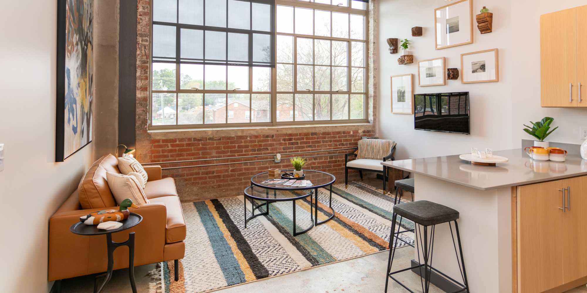 Modern living room at Mojud Lofts in Greensboro, North Carolina