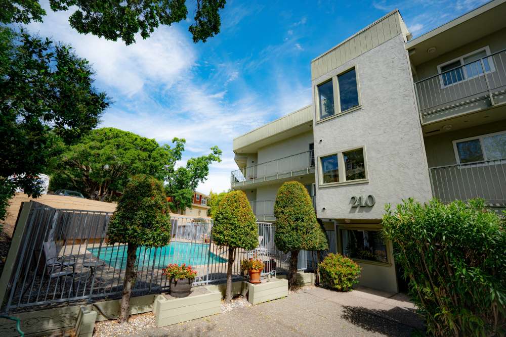 Exterior view of the apartments with swimming pool at Aqua Vista in Greenbrae, California