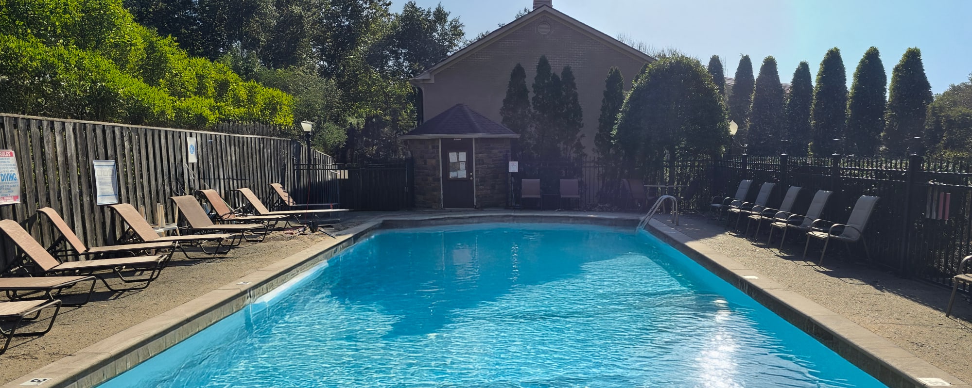 Exterior view of Davenport Condominiums in Nashville, TN featuring modern 2 and 3 bedroom apartment homes with landscaped grounds.