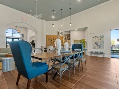 Clubhouse dining table and kitchen area at Auberge of Burleson in Burleson, Texas