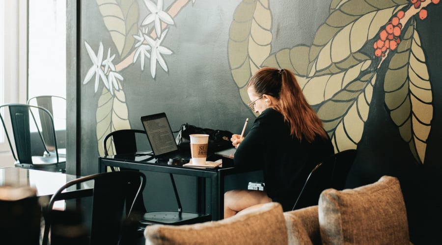 A resident studies over coffee near University Lofts Downtown, Jonesboro, Arkansas