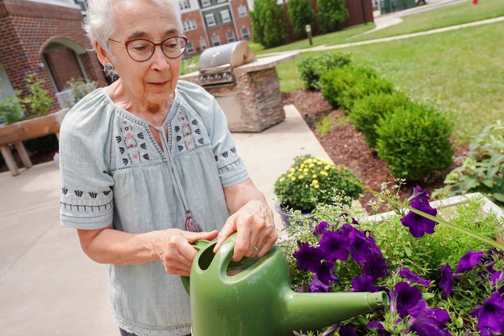 Resident gardening at Harmony at Independence in Virginia Beach, Virginia